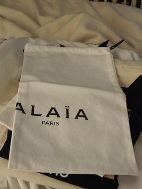 White Drawstring Dust Bag with Black Logo Detail